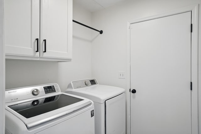106 Ruffin Rd, Summerville, SC 29486 - clothes washing area featuring separate washer and dryer and cabinet space