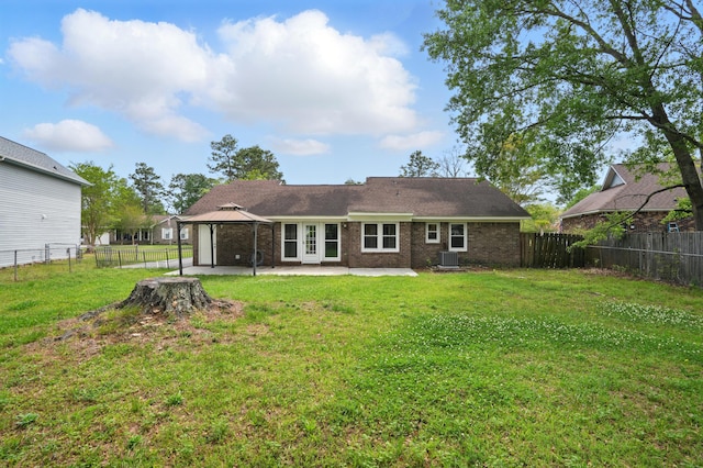 106 Ruffin Rd, Summerville, SC 29486 - back of house featuring a gazebo, a patio, a fenced backyard, and a lawn