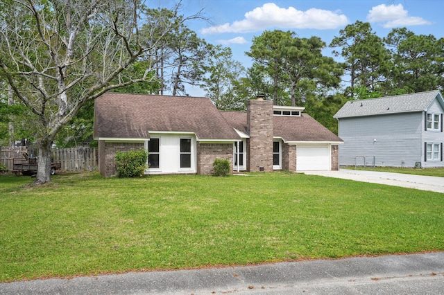 106 Ruffin Rd, Summerville, SC 29486 - mid-century modern home with a chimney, fence, concrete driveway, brick siding, and a front lawn