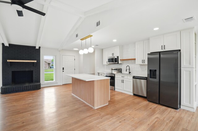 106 Ruffin Rd, Summerville, SC 29486 - kitchen with a kitchen island, visible vents, a ceiling fan, and appliances with stainless steel finishes