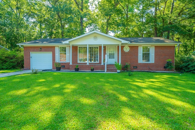 single story home featuring a front yard, a porch, and a garage