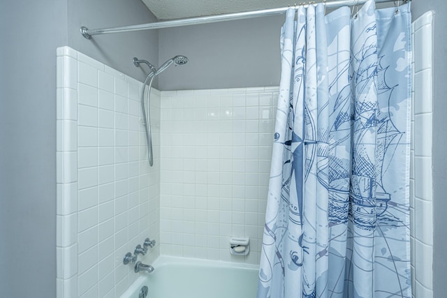 bathroom with shower / tub combo