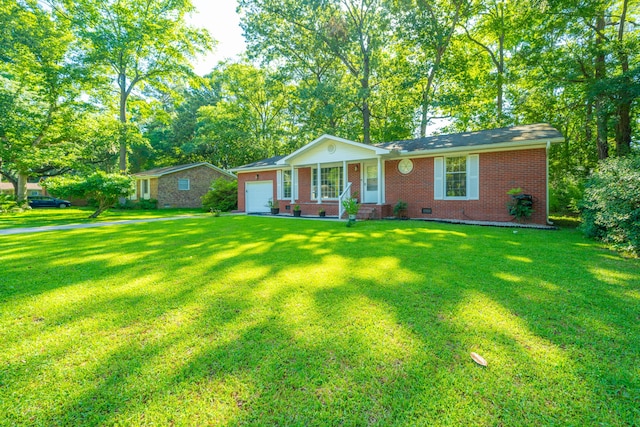 ranch-style home with a porch, a garage, and a front lawn