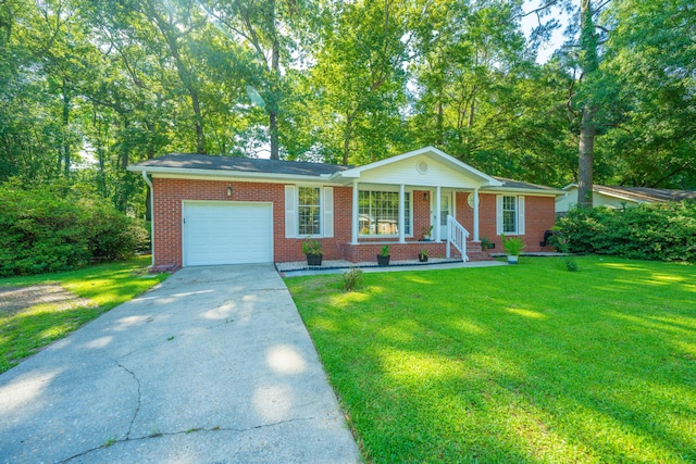 ranch-style home featuring a porch, a garage, and a front lawn