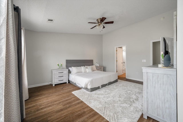 1219 Bradley Blvd, Summerville, SC 29486 - bedroom with wood finished floors, baseboards, a ceiling fan, and ensuite bathroom