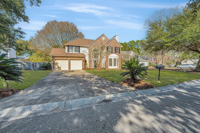 view of front of home featuring brick siding, concrete driveway, fence, a garage, and a front lawn