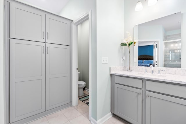 413 Ribiero Dr, Summerville, SC 29486 - full bathroom with toilet, a shower with door, ensuite bathroom, tile patterned flooring, and vanity