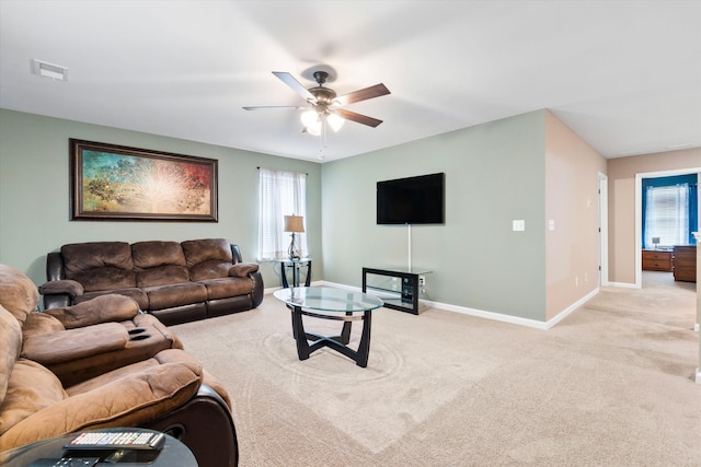 413 Ribiero Dr, Summerville, SC 29486 - living area featuring visible vents, baseboards, a ceiling fan, and light carpet