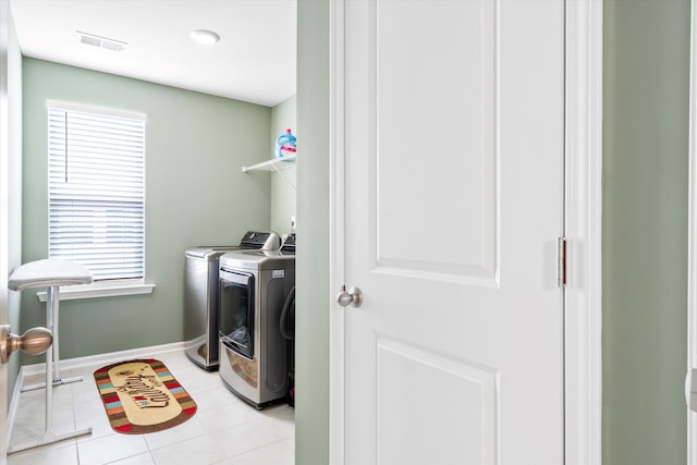 413 Ribiero Dr, Summerville, SC 29486 - laundry area featuring washer and clothes dryer, laundry area, a healthy amount of sunlight, and visible vents