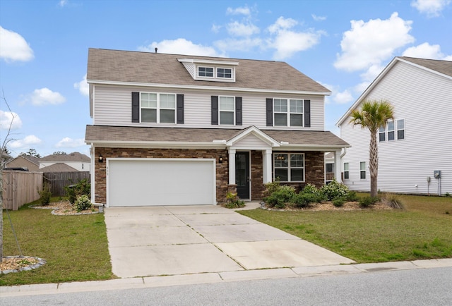 413 Ribiero Dr, Summerville, SC 29486 - view of front facade featuring fence, a garage, concrete driveway, and a front yard