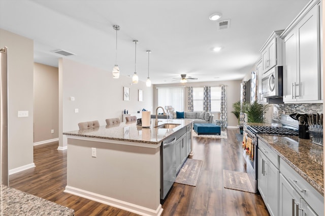 413 Ribiero Dr, Summerville, SC 29486 - kitchen featuring a sink, stainless steel appliances, open floor plan, and visible vents