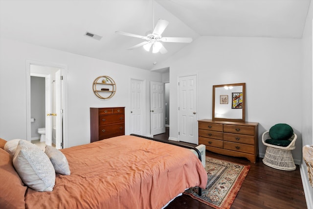 8676 Grassy Oak Trl, North Charleston, SC 29420 - bedroom with dark wood-style flooring, vaulted ceiling, connected bathroom, and ceiling fan