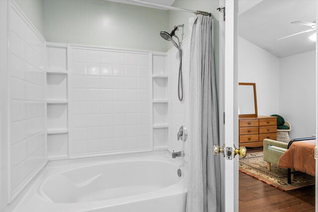 8676 Grassy Oak Trl, North Charleston, SC 29420 - full bath with shower / tub combo, wood finished floors, and ceiling fan