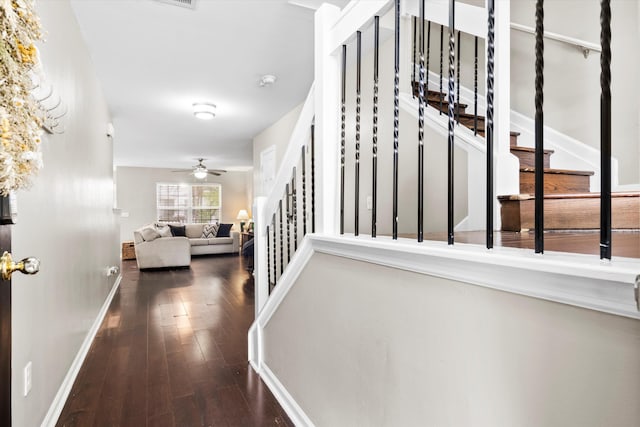 8676 Grassy Oak Trl, North Charleston, SC 29420 - hall with stairway, wood-type flooring, and baseboards