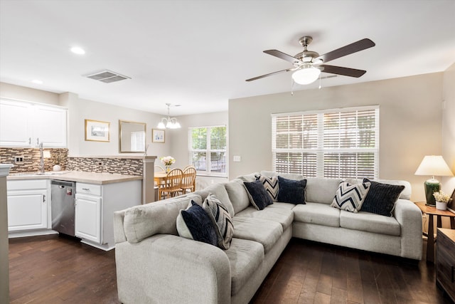 8676 Grassy Oak Trl, North Charleston, SC 29420 - living area featuring dark wood-type flooring, ceiling fan, a chandelier, and recessed lighting