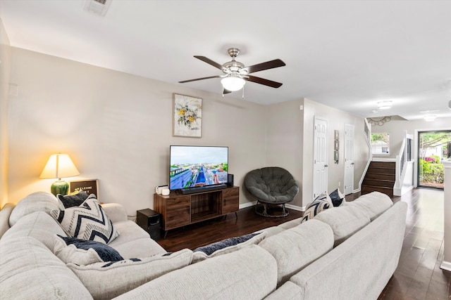 8676 Grassy Oak Trl, North Charleston, SC 29420 - living room featuring dark wood finished floors, stairway, a ceiling fan, and baseboards