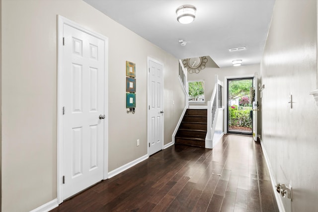 8676 Grassy Oak Trl, North Charleston, SC 29420 - foyer with wood finished floors, stairway, and baseboards