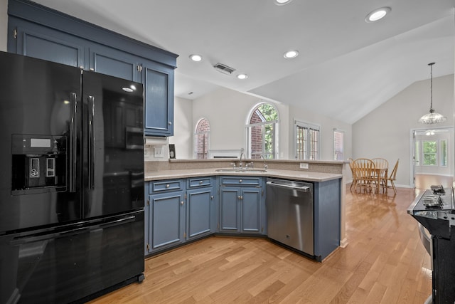 kitchen featuring black refrigerator with ice dispenser, stainless steel dishwasher, a peninsula, light countertops, and vaulted ceiling