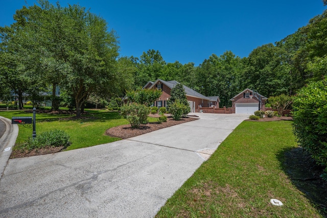 view of property hidden behind natural elements featuring a front yard
