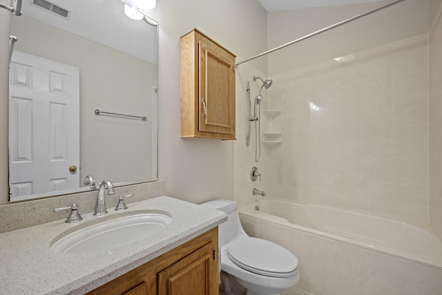 bathroom with toilet, shower / bath combination, and vanity