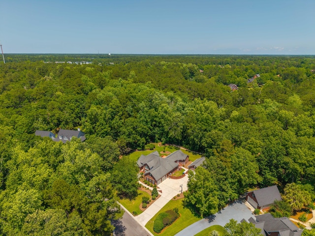 drone / aerial view of a heavily wooded area
