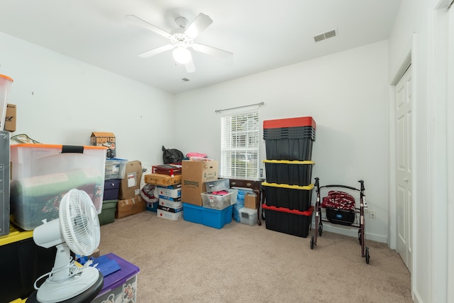 interior space featuring ceiling fan