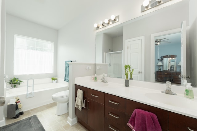 full bathroom featuring vanity, toilet, independent shower and bath, and ceiling fan