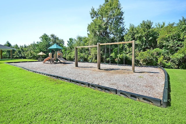 view of jungle gym with a yard