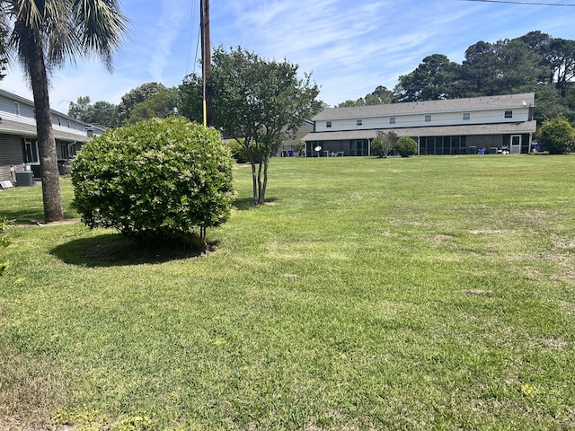 view of yard with central AC unit