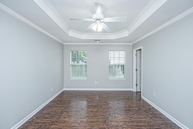 687 Ponderosa Dr, Charleston, SC 29414 - spare room with a tray ceiling, ceiling fan, dark wood-type flooring, and crown molding