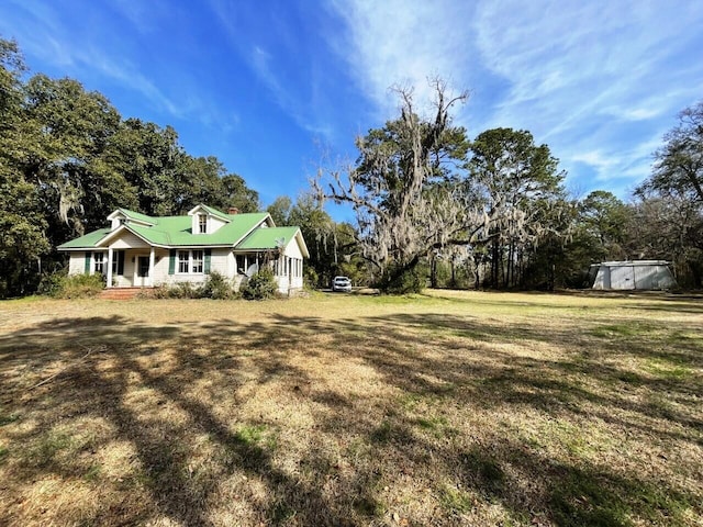 view of yard featuring covered porch