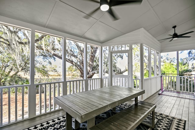 sunroom featuring ceiling fan