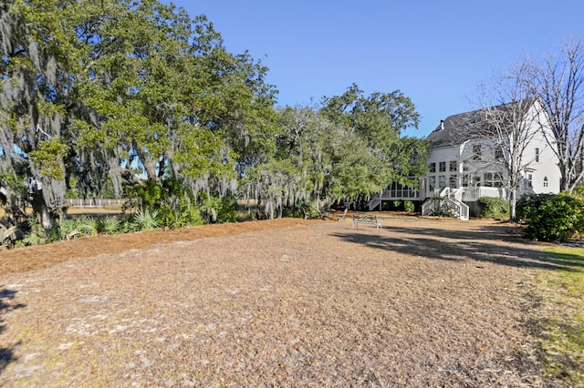 view of yard with a wooden deck