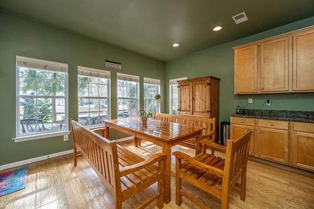 dining room with baseboards, recessed lighting, visible vents, and light wood-style floors