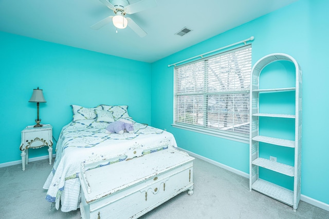 bedroom featuring carpet floors, visible vents, ceiling fan, and baseboards