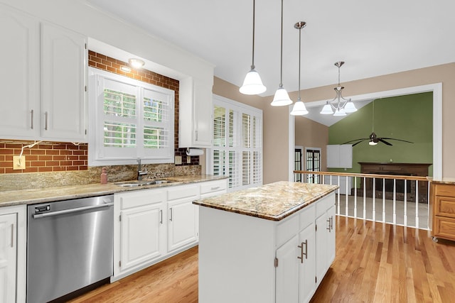 320 Compton Xing, Summerville, SC 29485 - kitchen featuring dishwasher, a sink, backsplash, light wood-style floors, and a center island