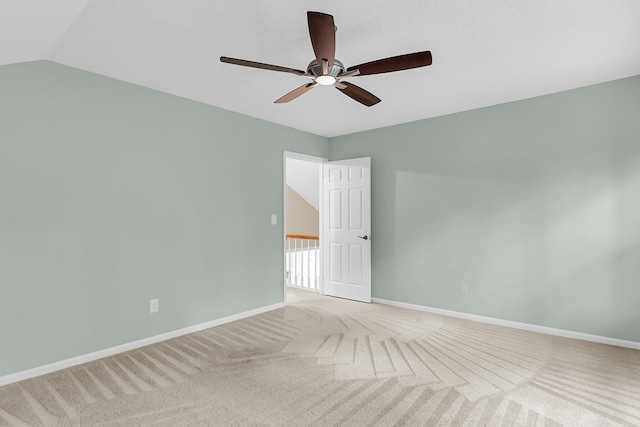 320 Compton Xing, Summerville, SC 29485 - spare room with a ceiling fan, baseboards, light carpet, and vaulted ceiling