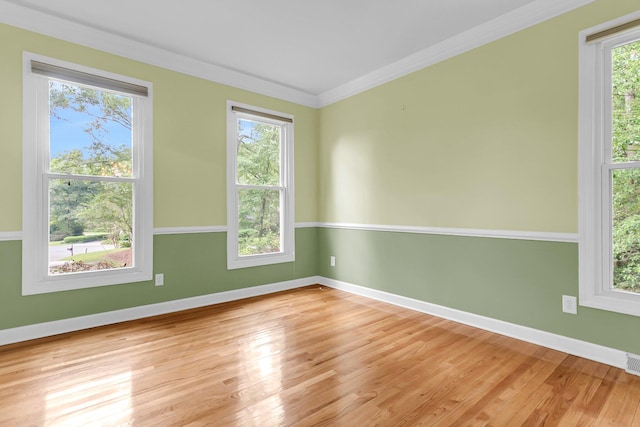 320 Compton Xing, Summerville, SC 29485 - empty room with wood finished floors, baseboards, and ornamental molding