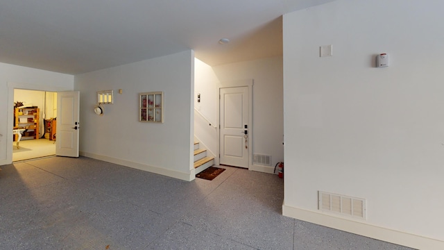2312 Rushland Landing Rd, Johns Island, SC 29455 - empty room with speckle patterned floor, stairs, and baseboards