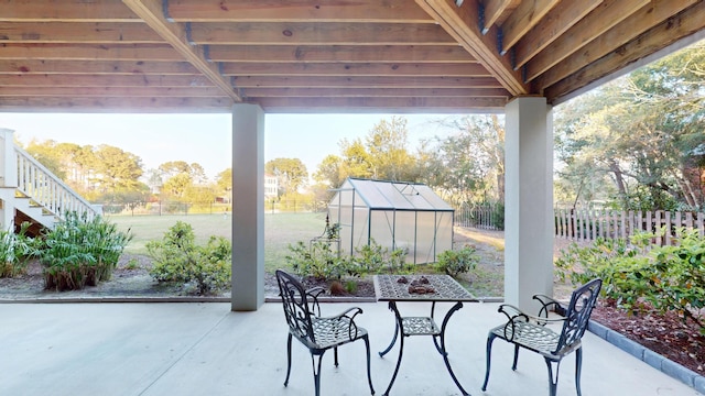 2312 Rushland Landing Rd, Johns Island, SC 29455 - view of patio featuring an exterior structure, an outbuilding, and stairs