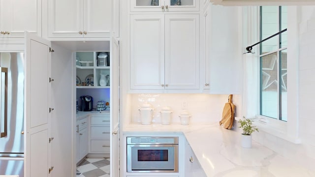 2312 Rushland Landing Rd, Johns Island, SC 29455 - kitchen with stainless steel appliances, white cabinets, glass insert cabinets, and light flooring