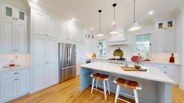 2312 Rushland Landing Rd, Johns Island, SC 29455 - kitchen with stainless steel refrigerator, light wood-type flooring, white cabinetry, and recessed lighting