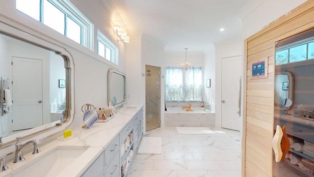 2312 Rushland Landing Rd, Johns Island, SC 29455 - full bathroom with marble look tile flooring, double vanity, a chandelier, a garden tub, and healthy amount of natural light