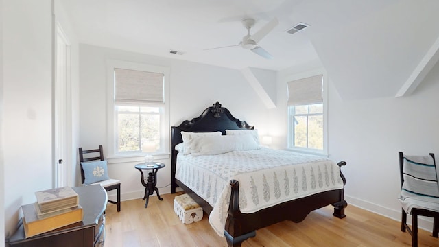 2312 Rushland Landing Rd, Johns Island, SC 29455 - bedroom with light wood-style floors, ceiling fan, baseboards, and vaulted ceiling