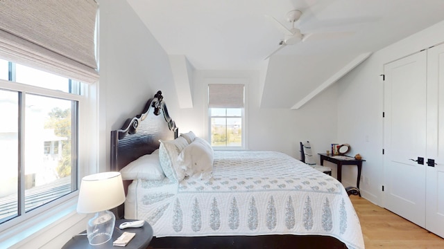 2312 Rushland Landing Rd, Johns Island, SC 29455 - bedroom with light wood-style flooring, a ceiling fan, vaulted ceiling, and a closet