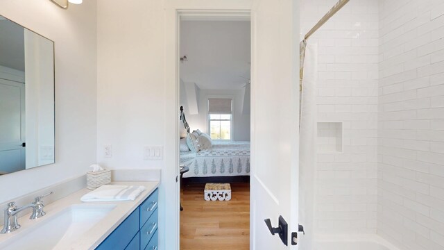 2312 Rushland Landing Rd, Johns Island, SC 29455 - bathroom featuring ensuite bathroom, wood finished floors, vanity, and shower / tub combo with curtain