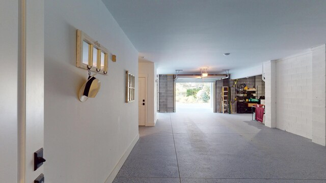 2312 Rushland Landing Rd, Johns Island, SC 29455 - hallway with baseboards and concrete floors