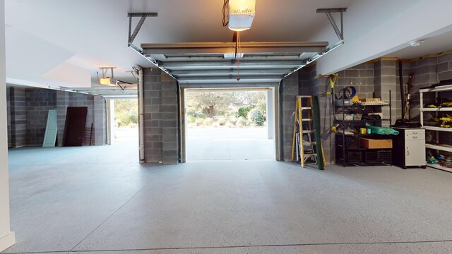 2312 Rushland Landing Rd, Johns Island, SC 29455 - garage with a garage door opener and concrete block wall