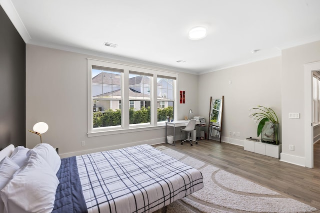 1234 Captain Rivers Dr, Charleston, SC 29412 - bedroom with wood finished floors, crown molding, baseboards, and a desk