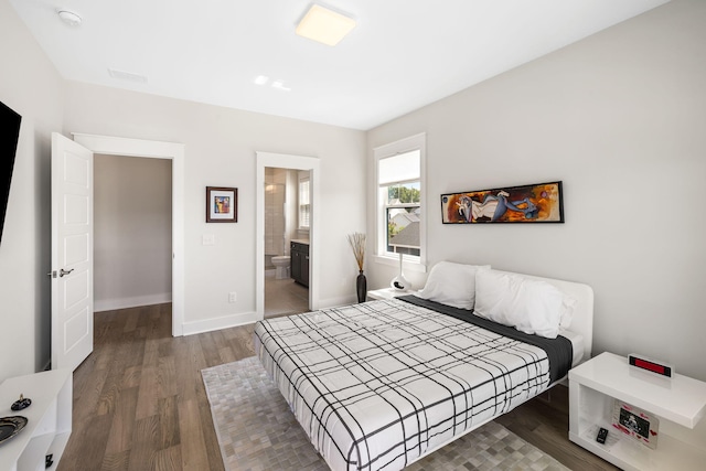 1234 Captain Rivers Dr, Charleston, SC 29412 - bedroom featuring wood finished floors, baseboards, and connected bathroom